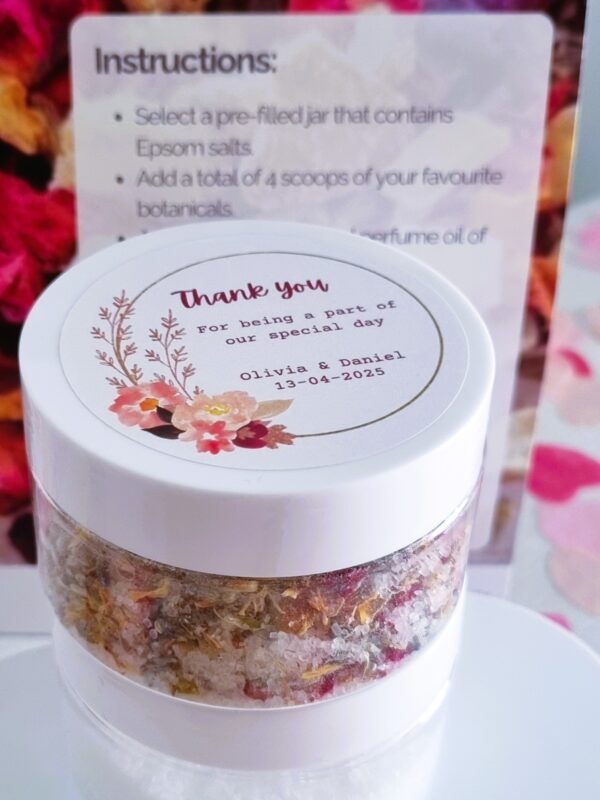 Wedding guest activities at a DIY bath salt station with essential oils and dried flowers at a wedding in Australia.