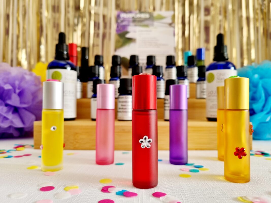Wedding guest activities at a DIY essential oil perfume station where guests create personalised perfumes at a wedding in Australia.