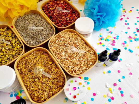 Wedding guest activities at a DIY bath salt station with essential oils and dried flowers at a wedding in Australia.