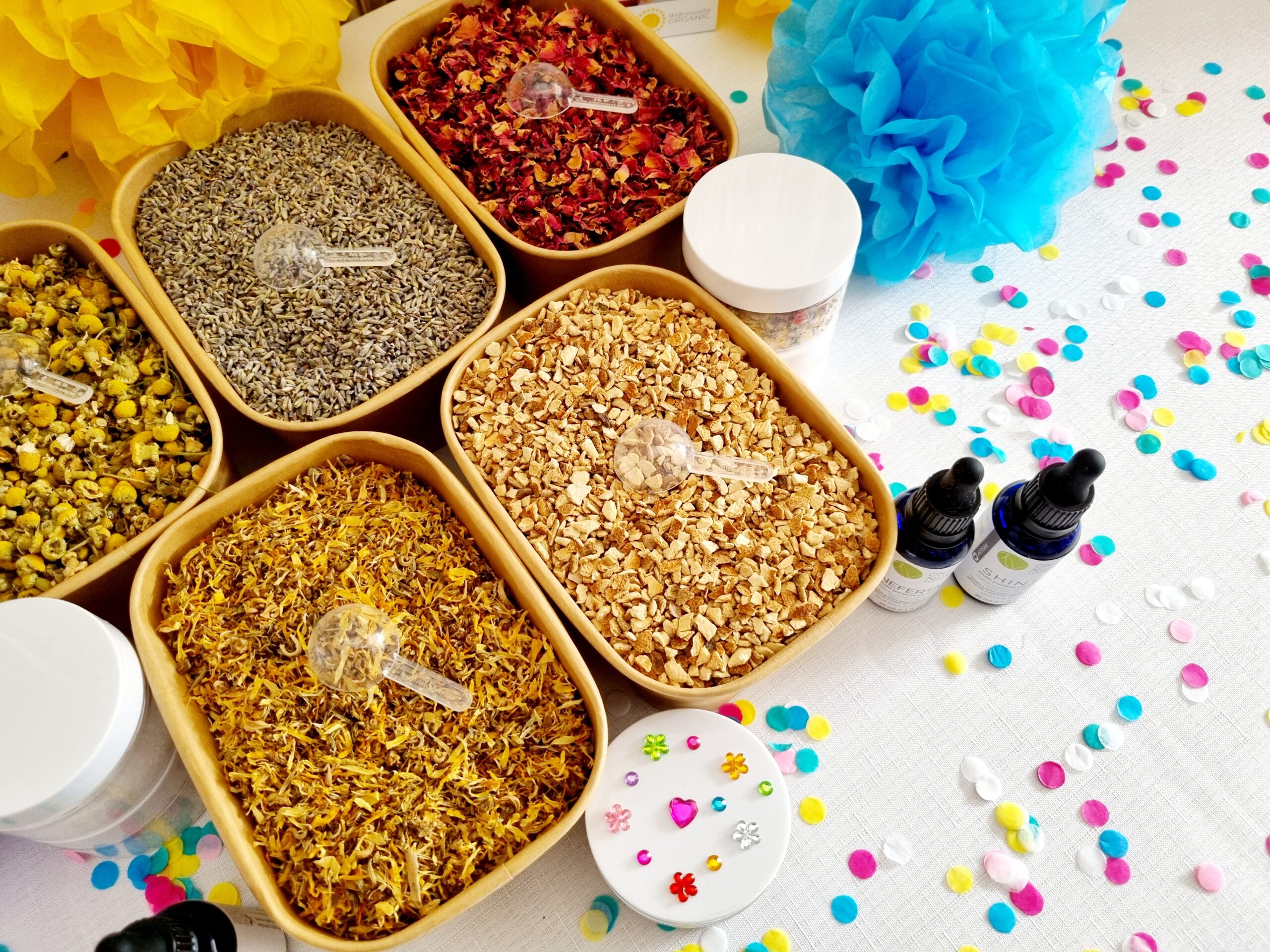 Wedding guest activities at a DIY bath salt station with essential oils and dried flowers at a wedding in Australia.