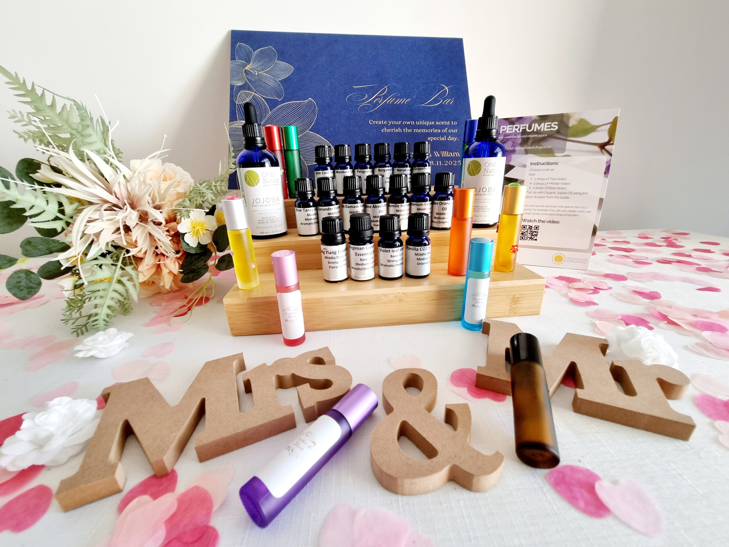 Wedding guest activities at a DIY essential oil perfume station where guests create personalised perfumes at a wedding in Australia.