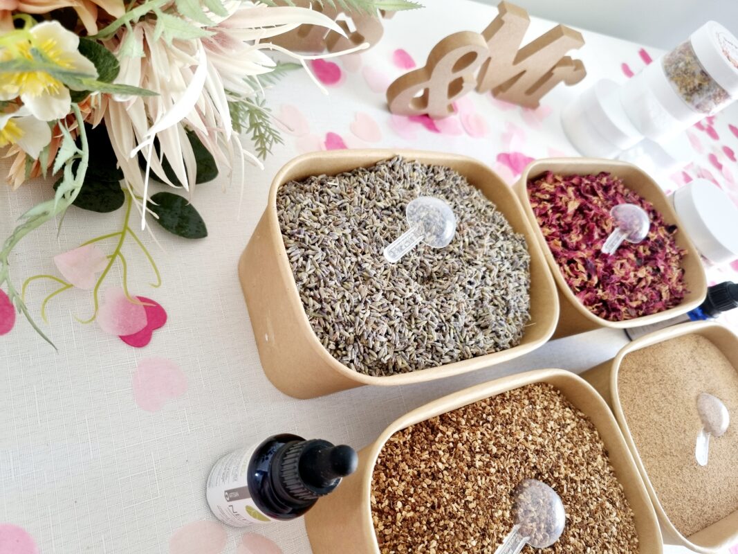 Wedding guest activities at a DIY body scrub station where guests make personalised body scrubs with natural ingredients at a wedding in Australia.